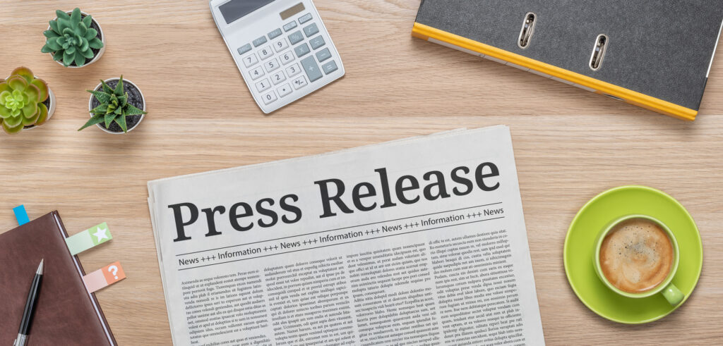Newspaper on a desk with the headline Press release shows how important it is for your business